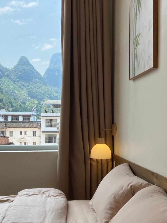 Pomelo Hostel Xingping Яншо Экстерьер фото