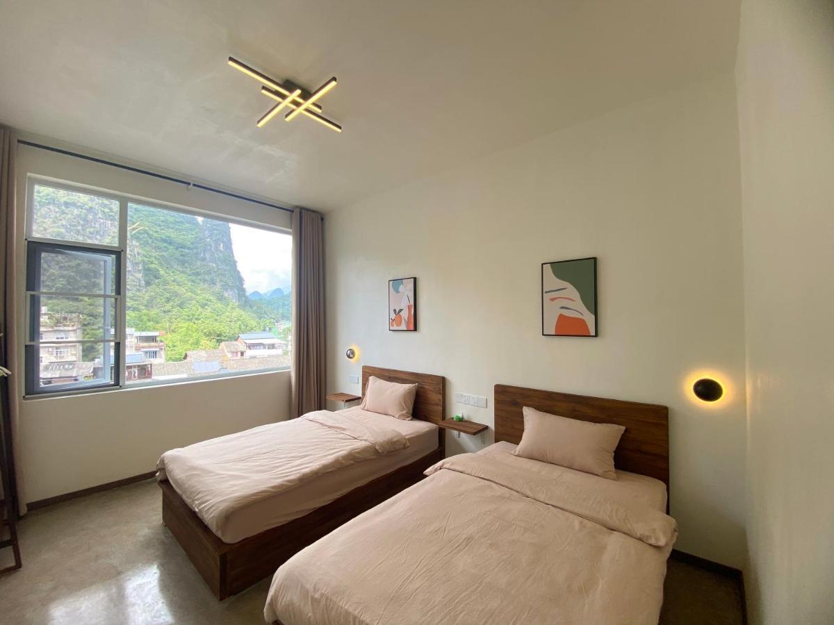 Pomelo Hostel Xingping Яншо Экстерьер фото